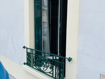 Réalisation peinture gris encadrements de fenêtre secteur Paris Les Lilas