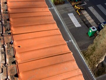 Nettoyage de gouttière avec pose de grillage secteur Paris Les Lilas